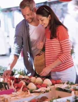 Couple shopping at farmers market