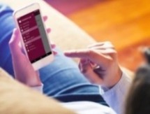 Banking on a phone from the couch