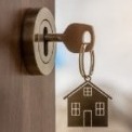 Key in door of new home