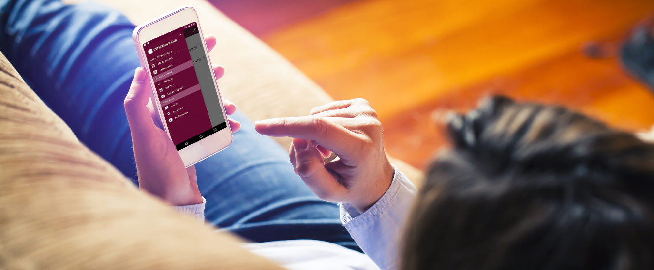 Banking on a phone from the couch