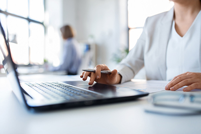 Woman working on a business laptop