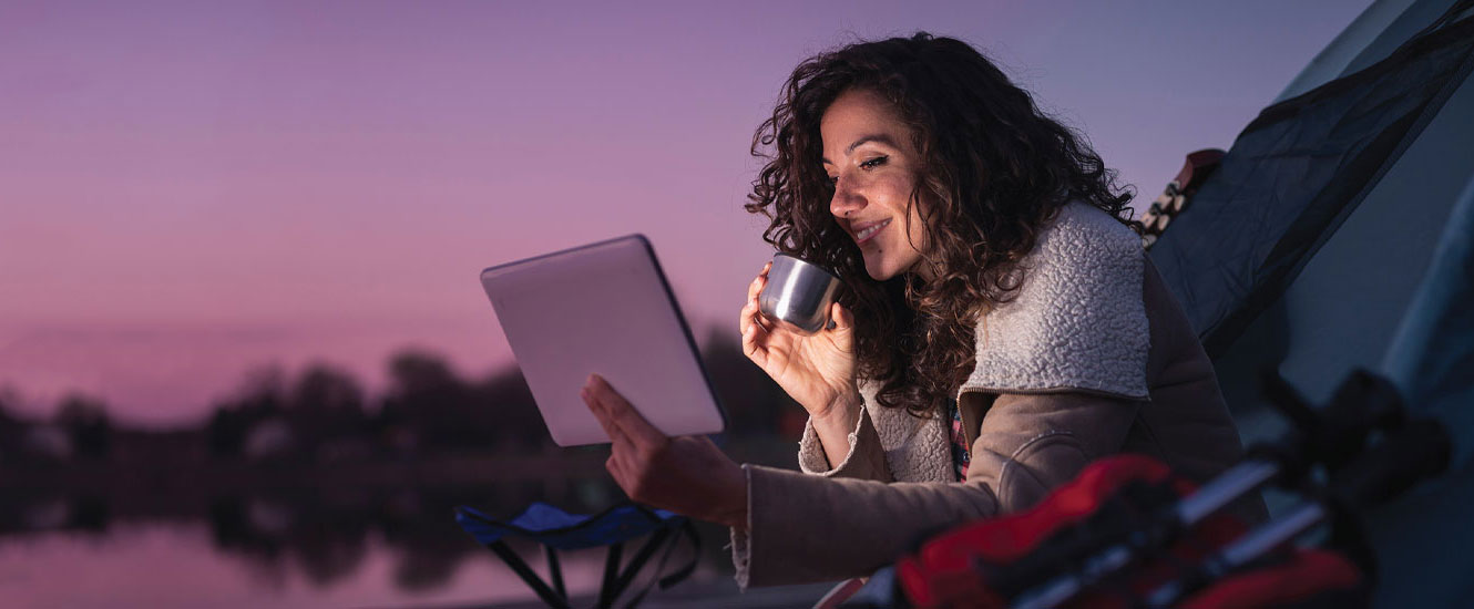 Woman checking her account on a tablet