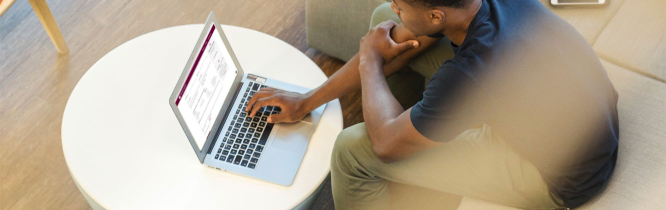 Man typing on laptop