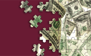 Puzzle pieces with money on them